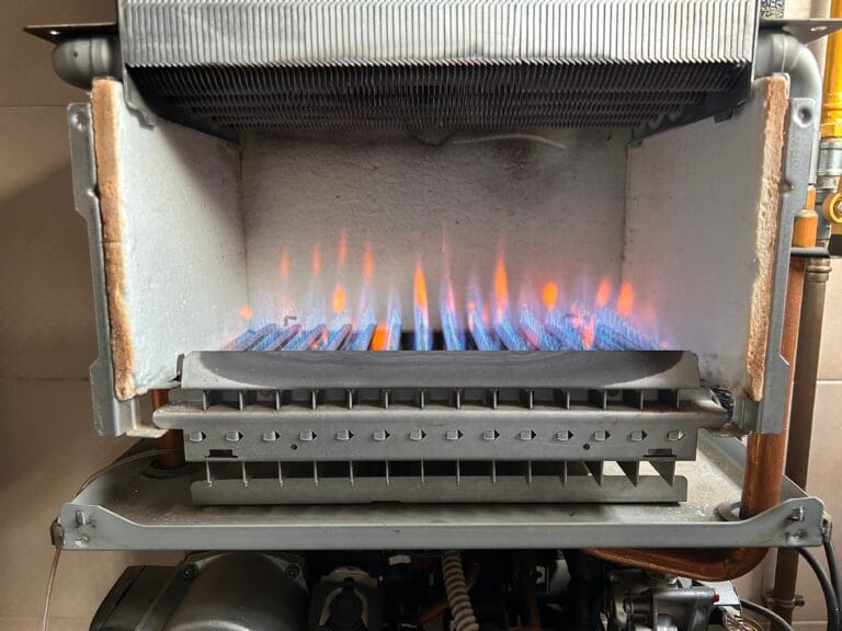 A modern electric fireplace with glowing flames burning brightly.